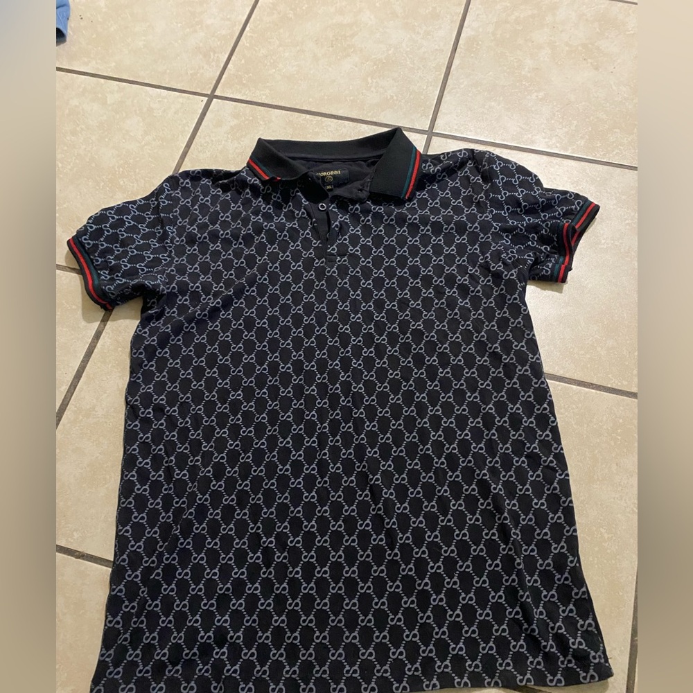 Men's Black Polo with Red-Trim Collar and Interlock Pattern